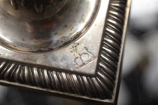 A pair of late George II cast silver candlesticks by Thomas Whipham and Charles Wright, 45 oz.